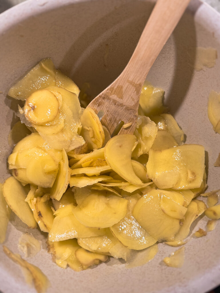 a bowl of food with a wooden fork